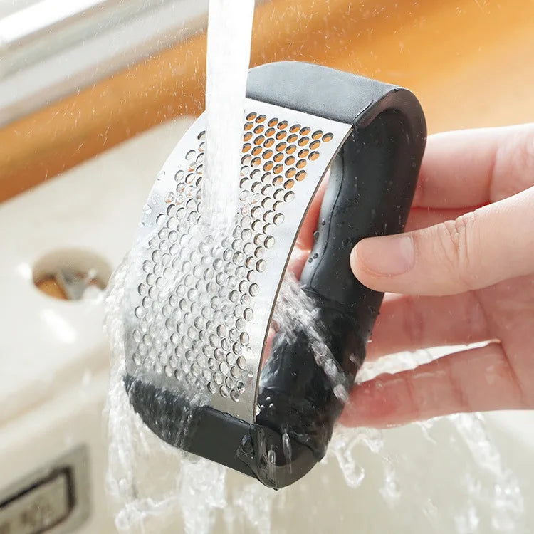 Kitchen Charm™ Stainless Steel Garlic Press